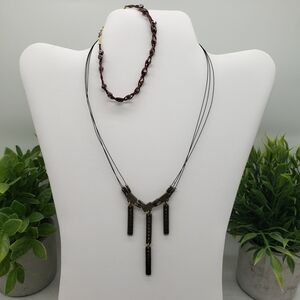 Chic Black Gold Beaded Necklace by Umtha and Roped Bracelet with Beaded Accents